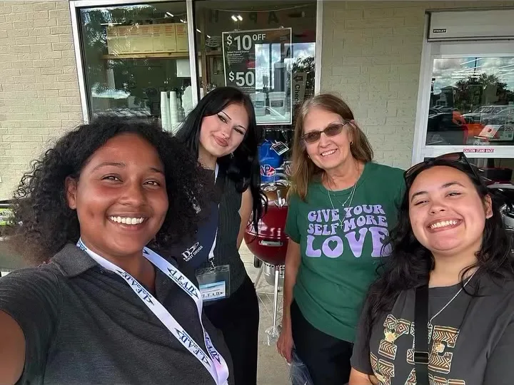 GA Jersey Village staff wearing L.E.A.D. lanyards while canvassing in the community