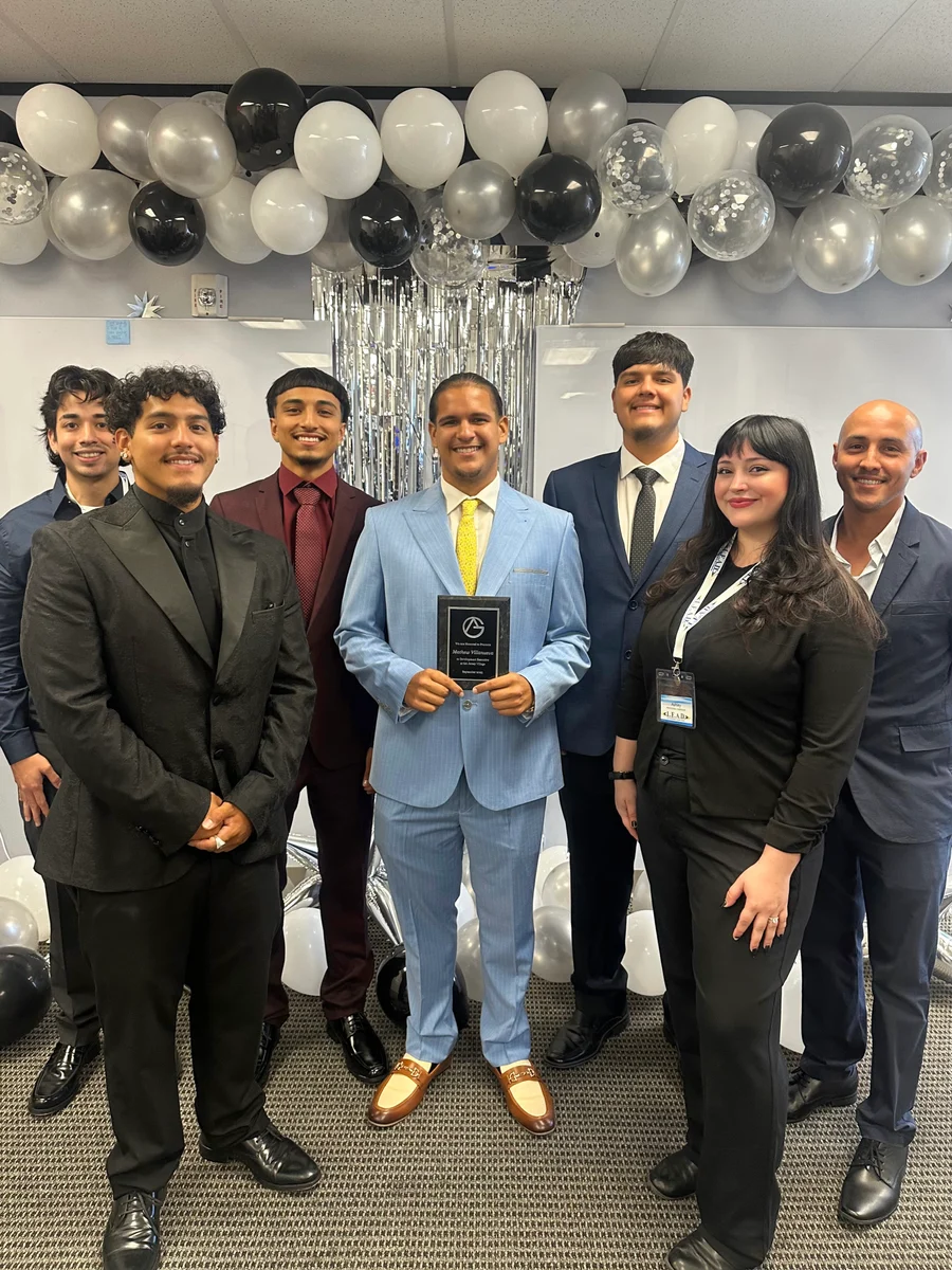 The GA Jersey Village team celebrating an award together