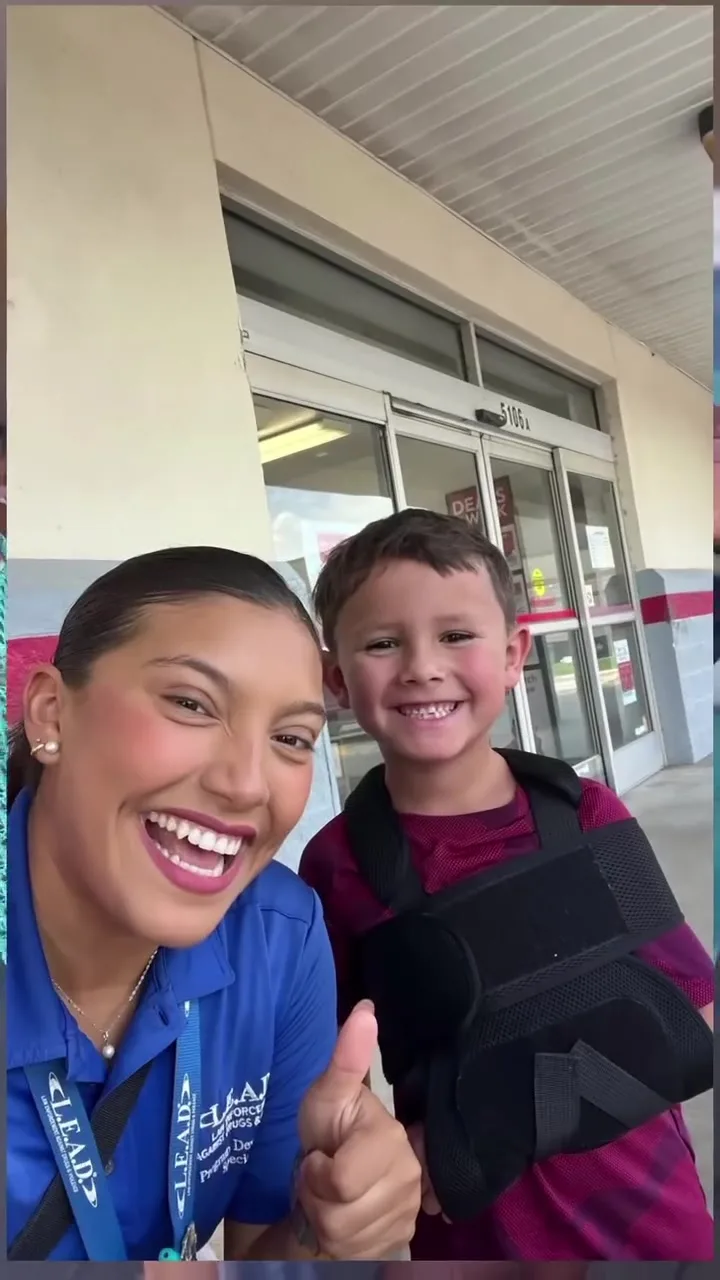 A GA Jersey Village team member connecting with a child during a community outreach event in Houston